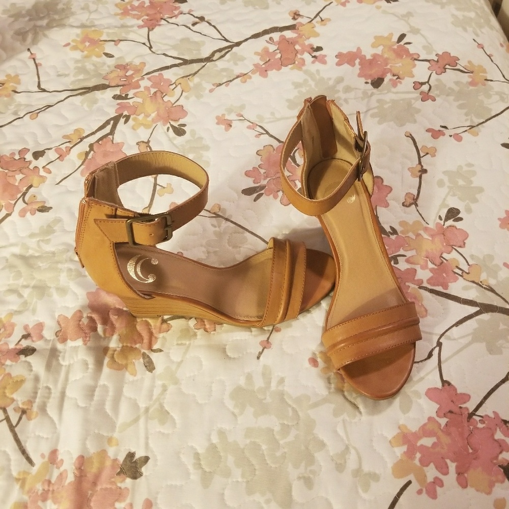 Tan wedged shoes